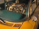 A taxi with Turkish rugs as seats! Perfect!