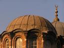An odd sight: the distinct dome of an orthodox church with an Islamic crescent added to it.