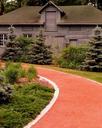 Sculpture Garden path and old building.