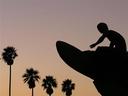 Surfing statue at Huntington Beach.